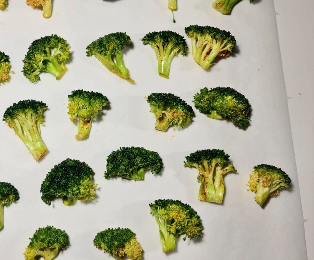 roasted broccoli on a baking sheet