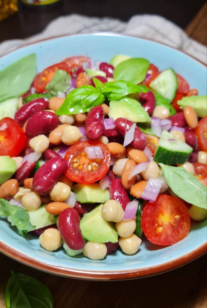 a bowl of salad with beans and vegetables