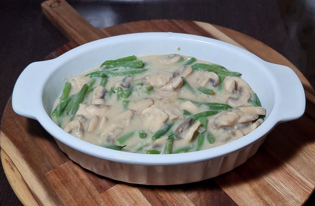 a bowl of food on a wood surface